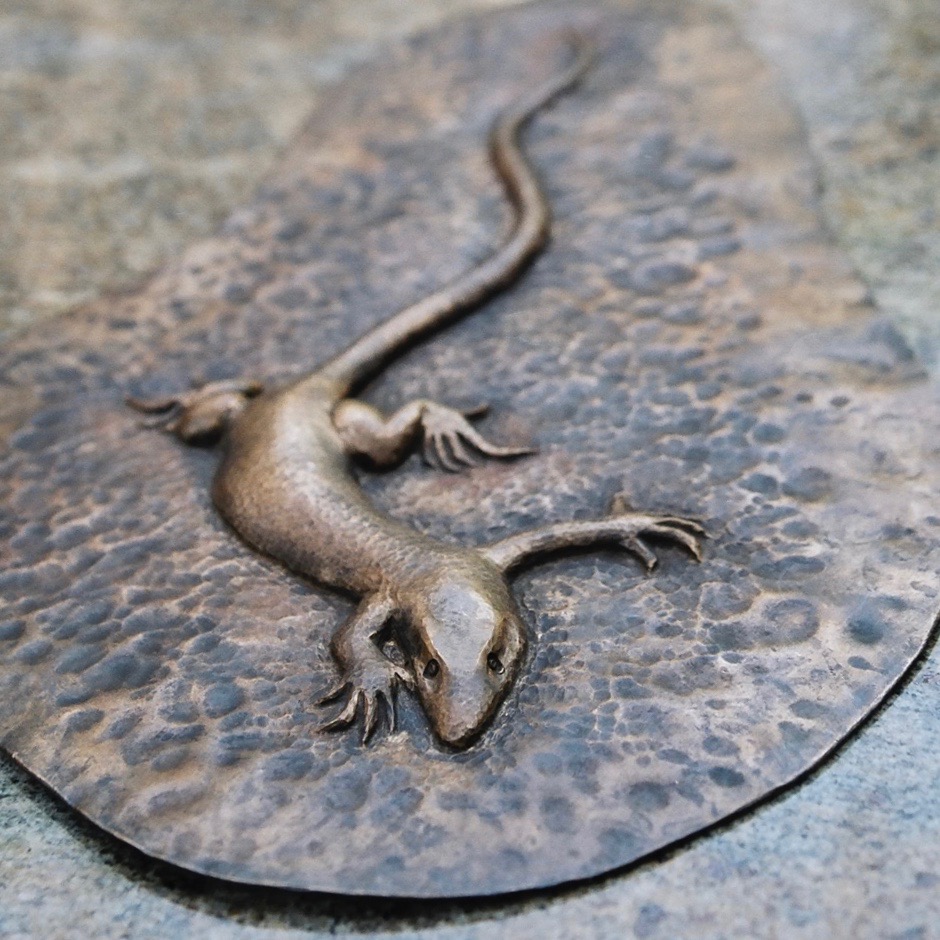 Lizard. about 14" x 9". bronze. high relief chasing. Commissioned by Audubon Center in Debs Park, Los Angeles, CA. Photo by Troy Evans